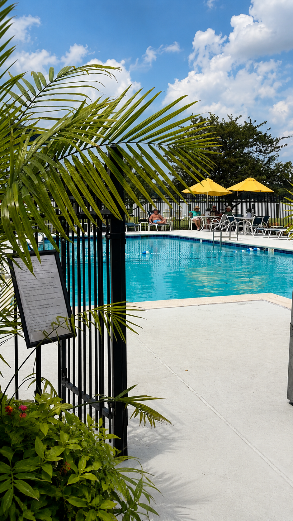 Chesapeake Yacht Club pool and patio with yellow umbrellas